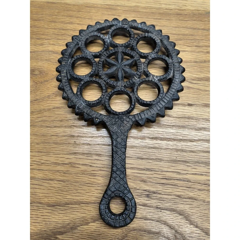 Vintage Black Cast Iron Trivets (set of 3)‎